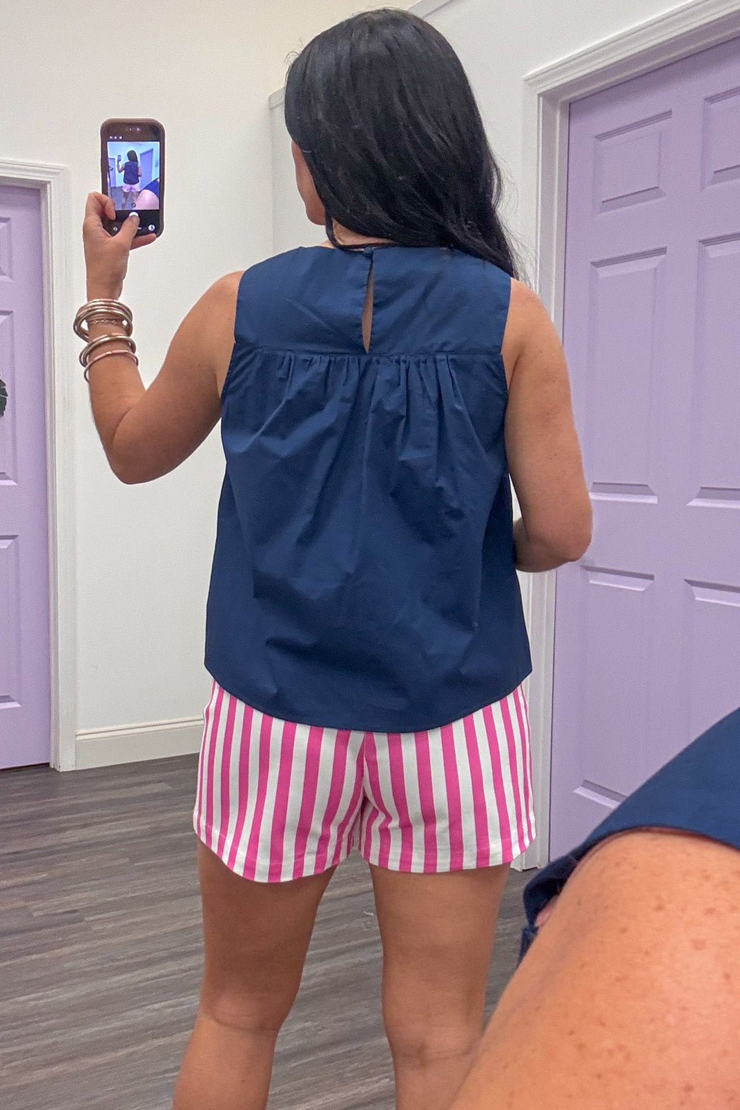 solid navy sleeveless cotton top with back keyhole button closure