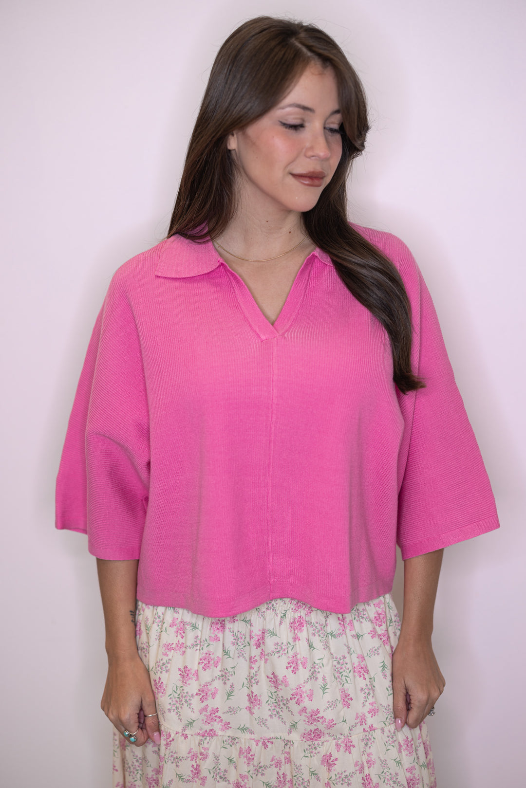 Women's pink ribbed knit top with a collar by Entro