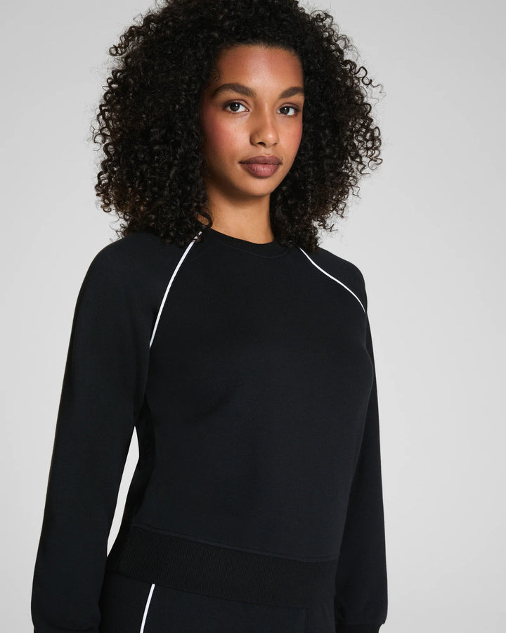 spanx airessentials black pique crewneck top close