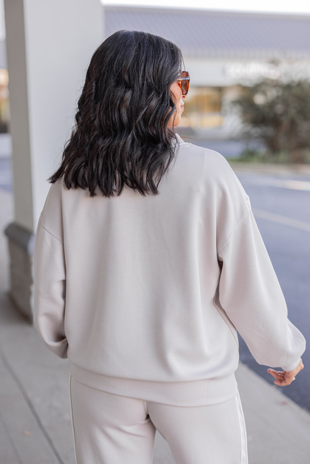 Women's mocha and cream scuba knit top by Rae Mode showing up close back view