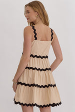 Entro Tan tiered sleeveless dress with black scalloped piping trim