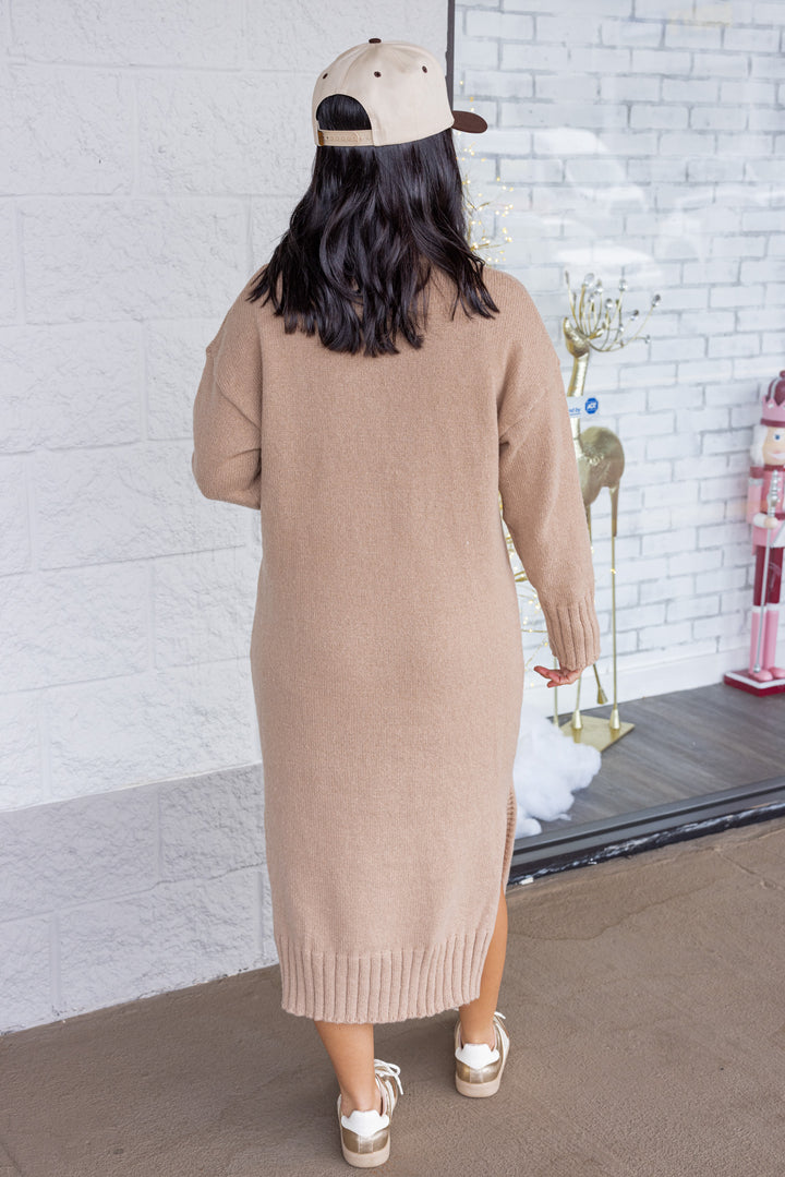 Women's taupe knit long sleeve turtleneck midi sweater dress by GeeGee showing full back view