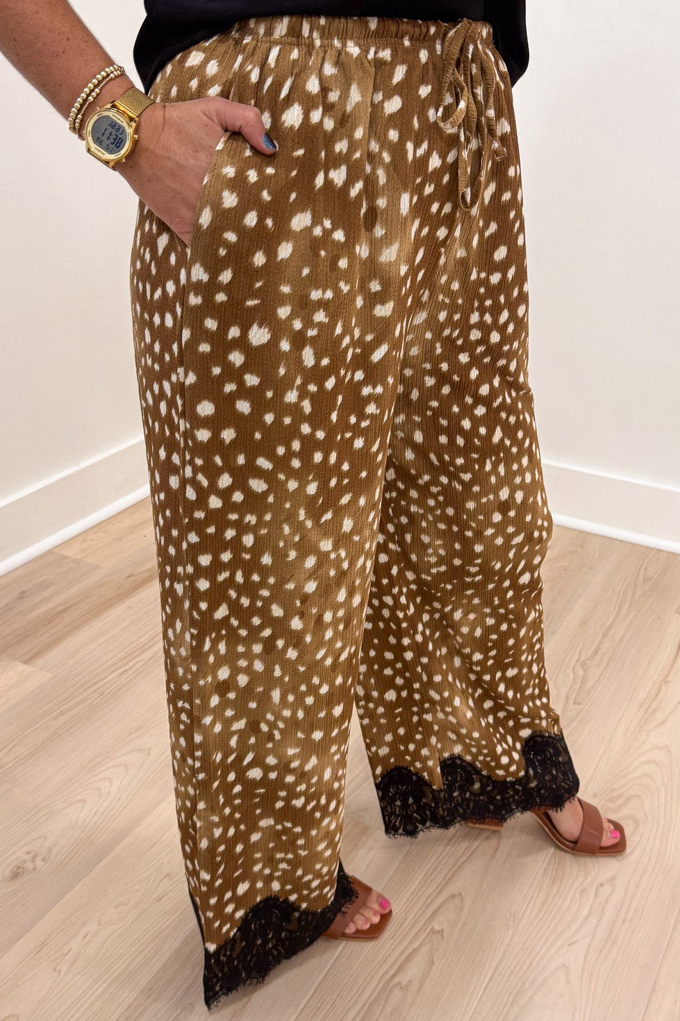 taupe and cream deer print with black lace hem elastic waist wide leg pants with front pockets