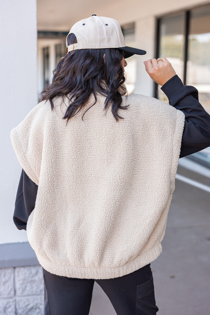 Women's taupe sherpa vest by Rae Mode showing back view