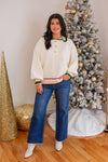 ivory red green trim 90s style sweater