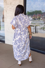 blue floral print smocked midi dress