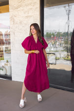 plum textured bubble sleeve midi dress