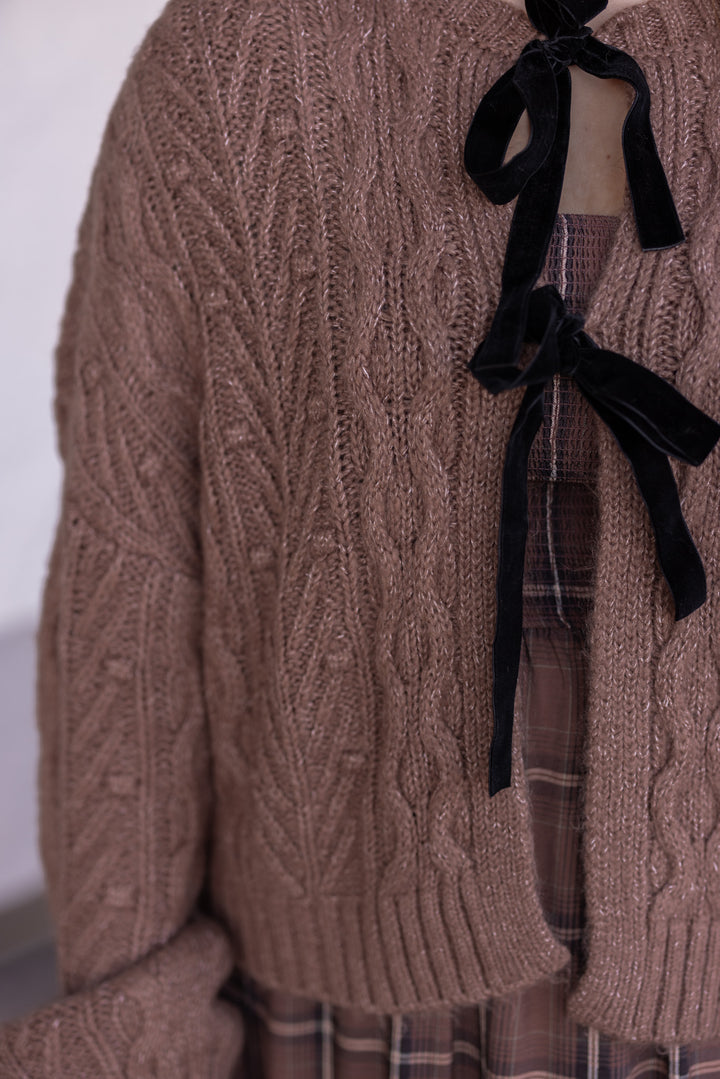 Women's mocha brown cable knit sweater cardigan by Blu Pepper showing black bow tie closures