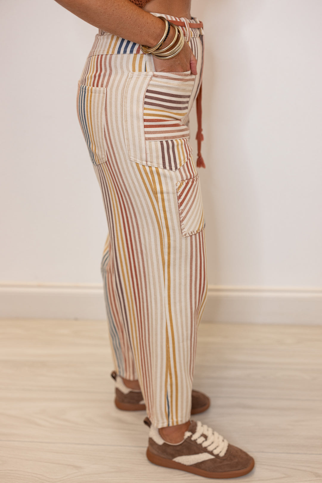 Women's cream washed twill barrel pants with multicolor and multi patterned stripes by Fantastic Fawn showing up close side view