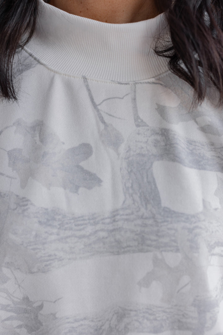 Women's grey snow camo oversized sweatshirt by BucketList showing ribbed mock neckline