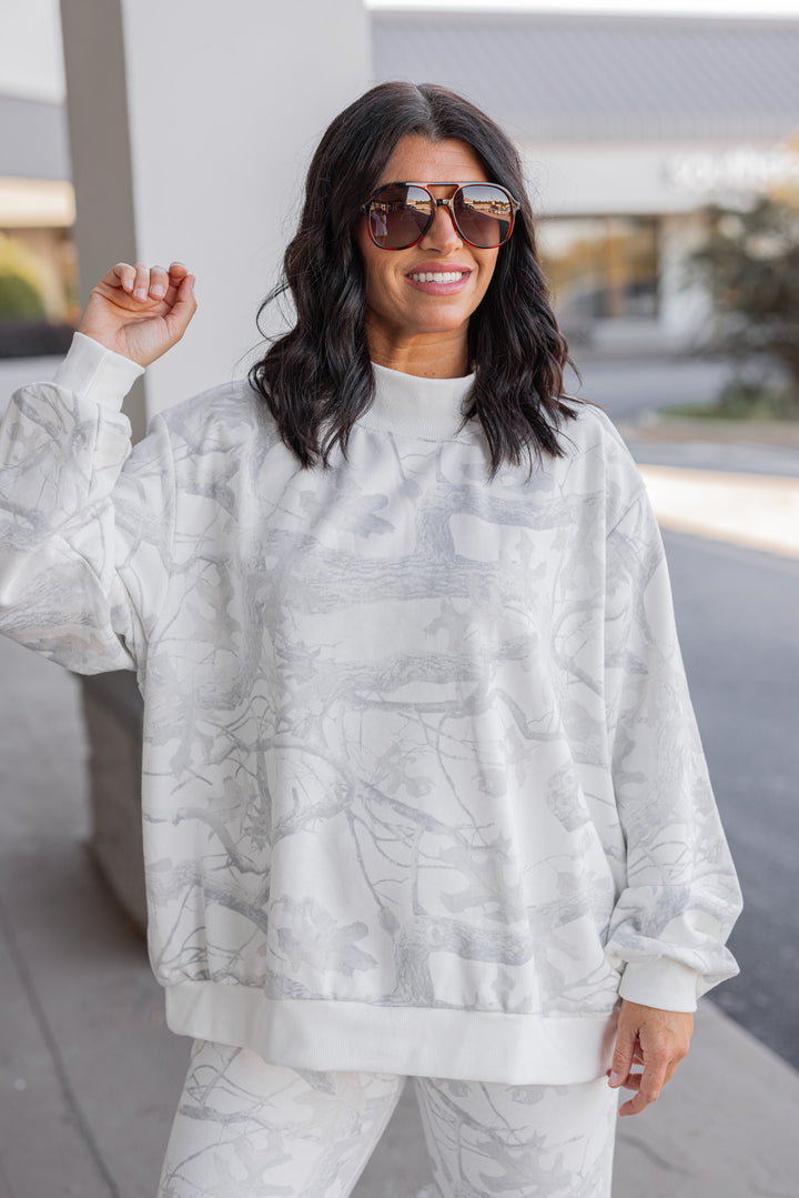 Women's grey snow camo oversized sweatshirt by BucketList showing up close front view