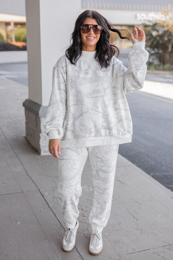 Women's grey snow camo oversized sweatshirt by BucketList showing full front view