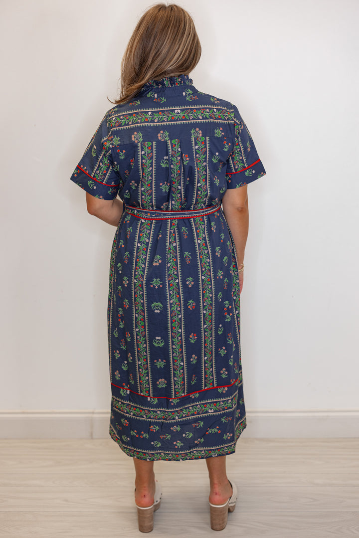Women's navy blue button front midi dress with floral trellis print and red trim by Entro showing full back view
