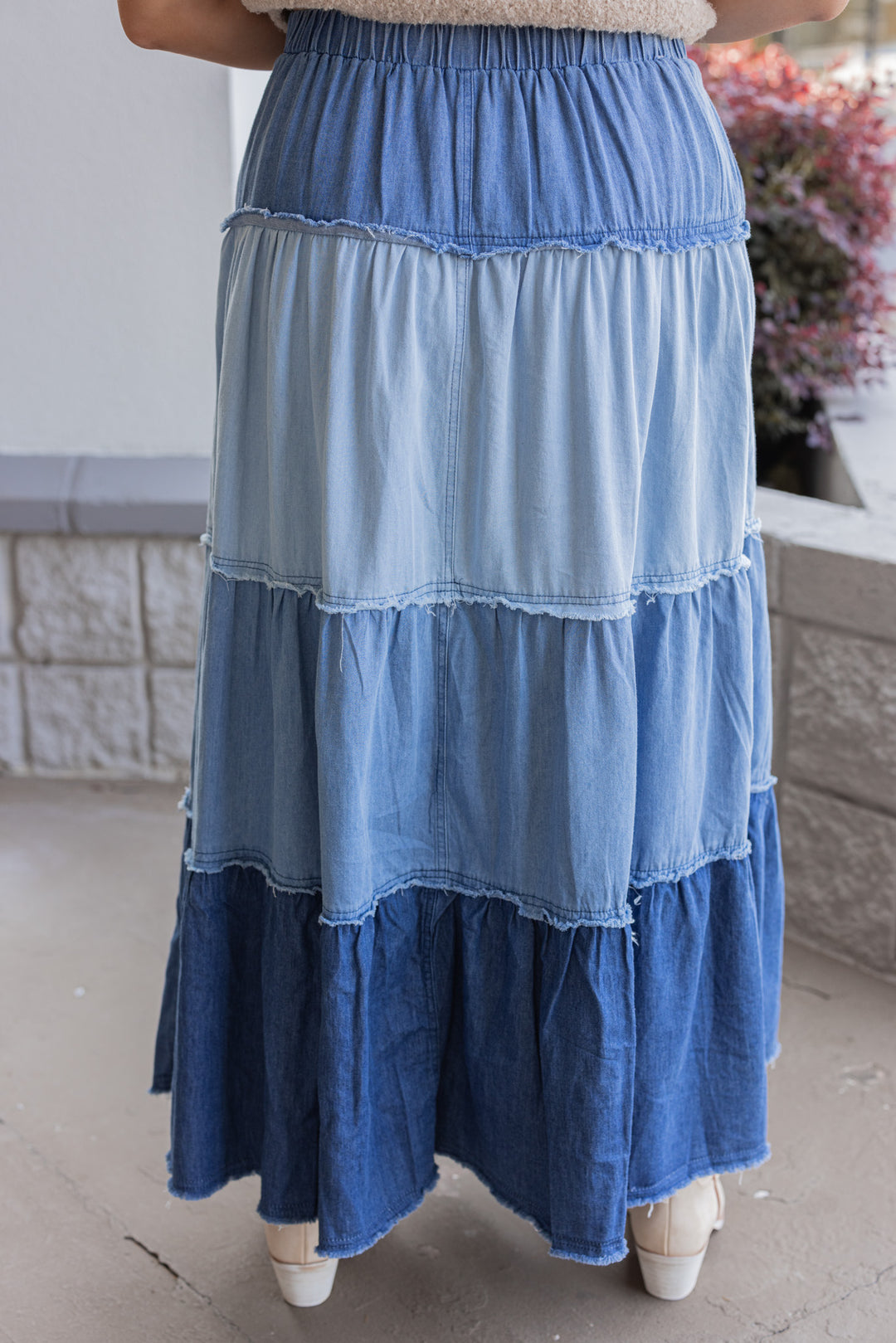 Women's ruffle tiered denim maxi skirt in multi shades of blue showing up close back view