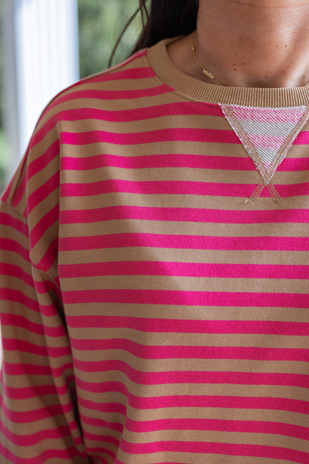 Hot pink and taupe striped pullover by Wishlist showing up close view of french terry knit fabric