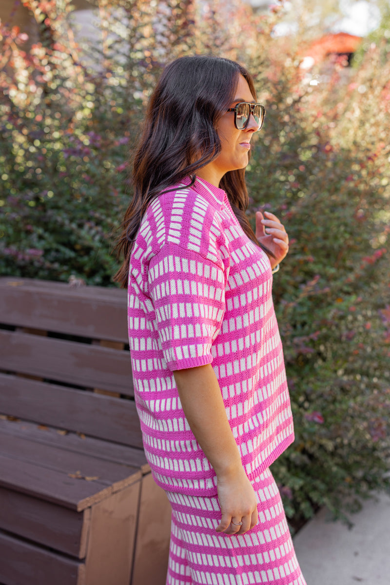 pink checkered sweater knit top