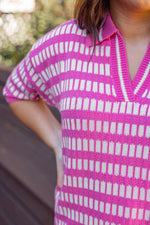 pink checkered sweater knit top