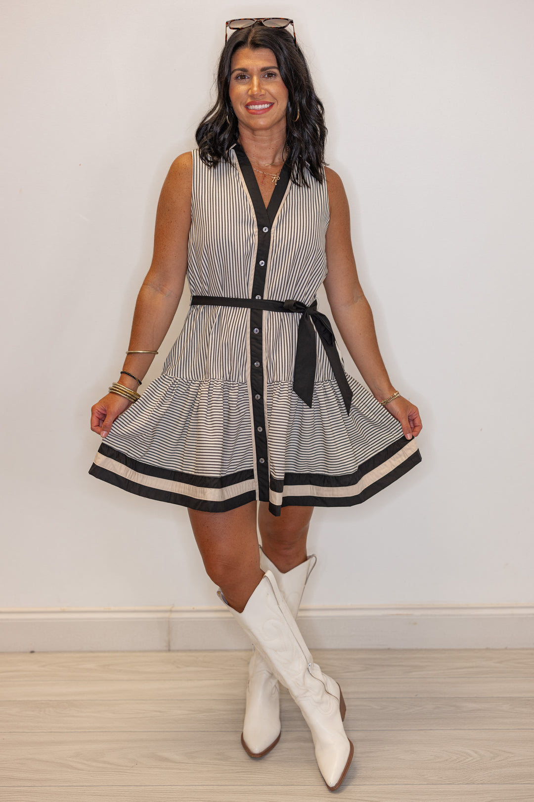 Womens black and cream striped button front dress with belted waist by Entro showing full front view