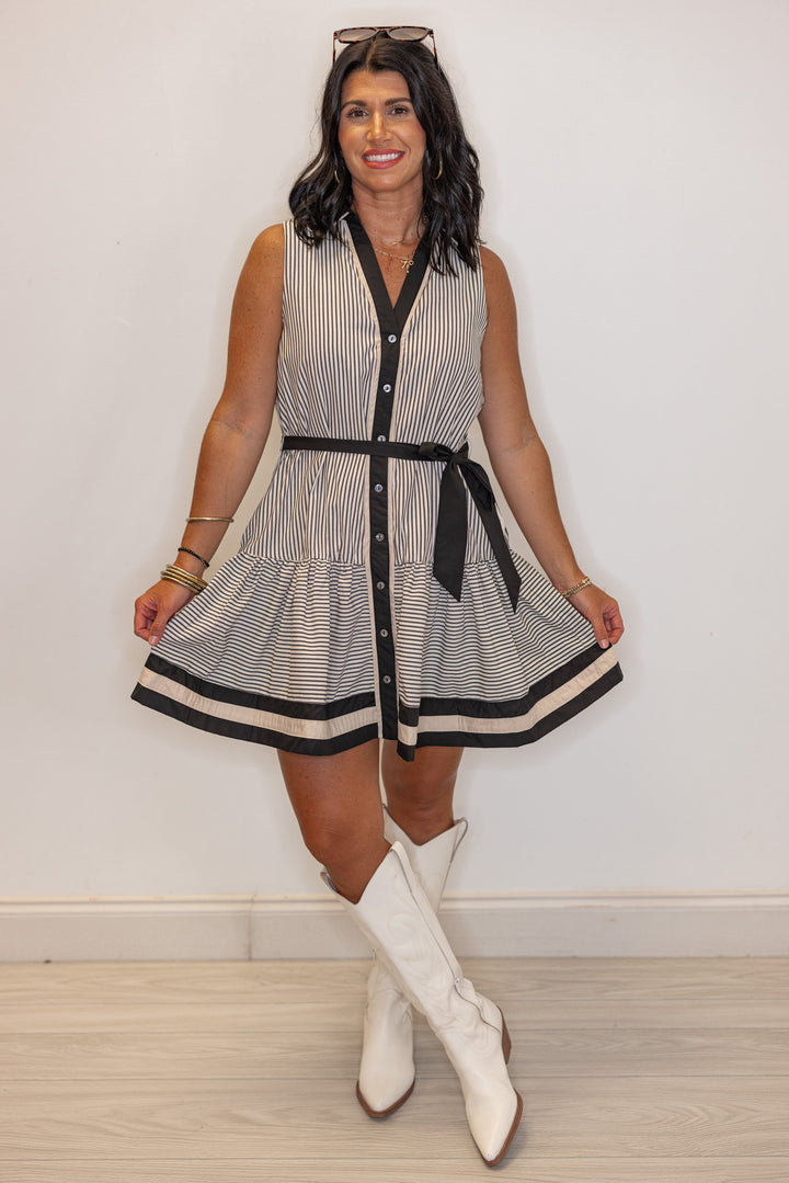 Womens black and cream striped button front dress with belted waist by Entro showing full front view