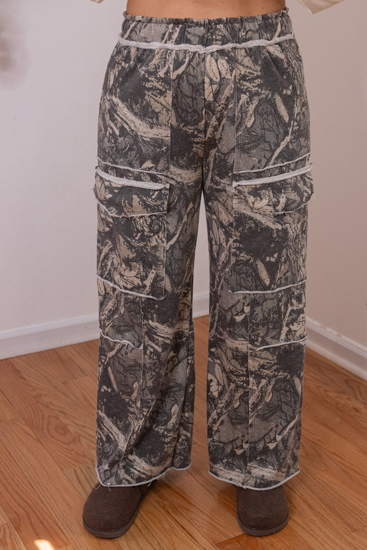 Women's washed hunter green terry knit wide leg cargo pants in tree camo print by J. Her showing up close front view