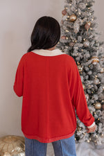 red ivory colorblock pullover top