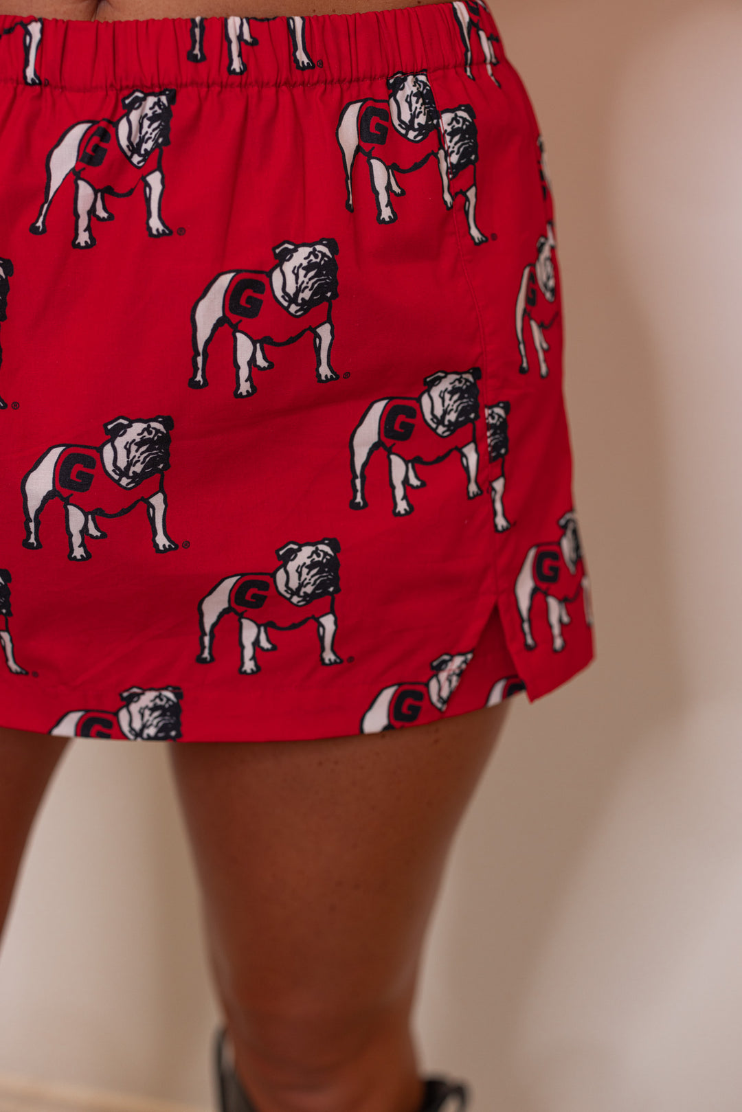 Womens red Bulldogs poplin skort by Stewart Simmons showing up close view of bulldog print