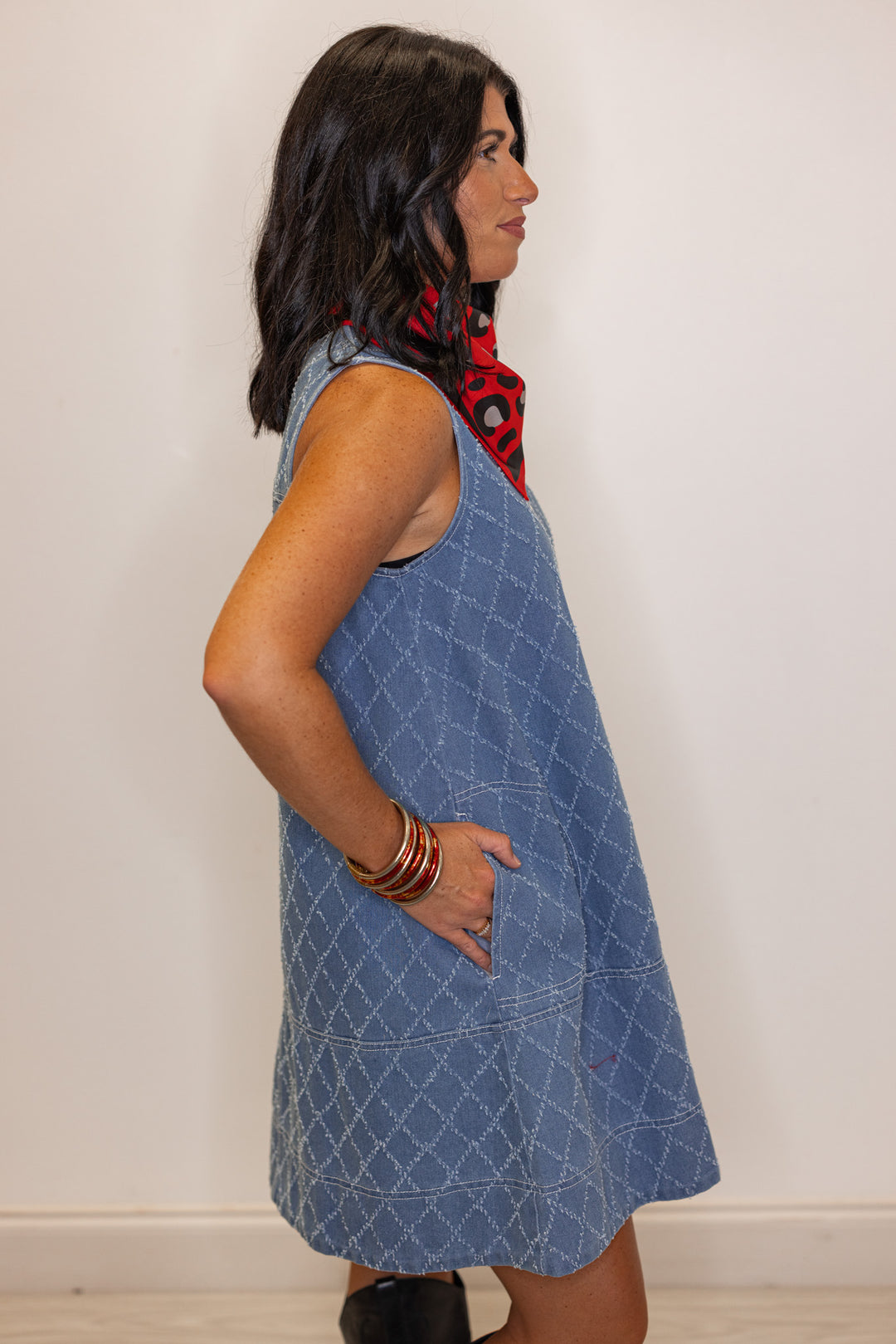 Womens blue denim zip front dress with frayed diamond print by Entro showing up close side view
