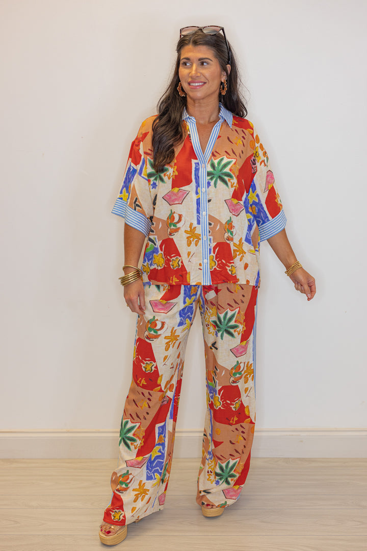 tropical resort printed button up top