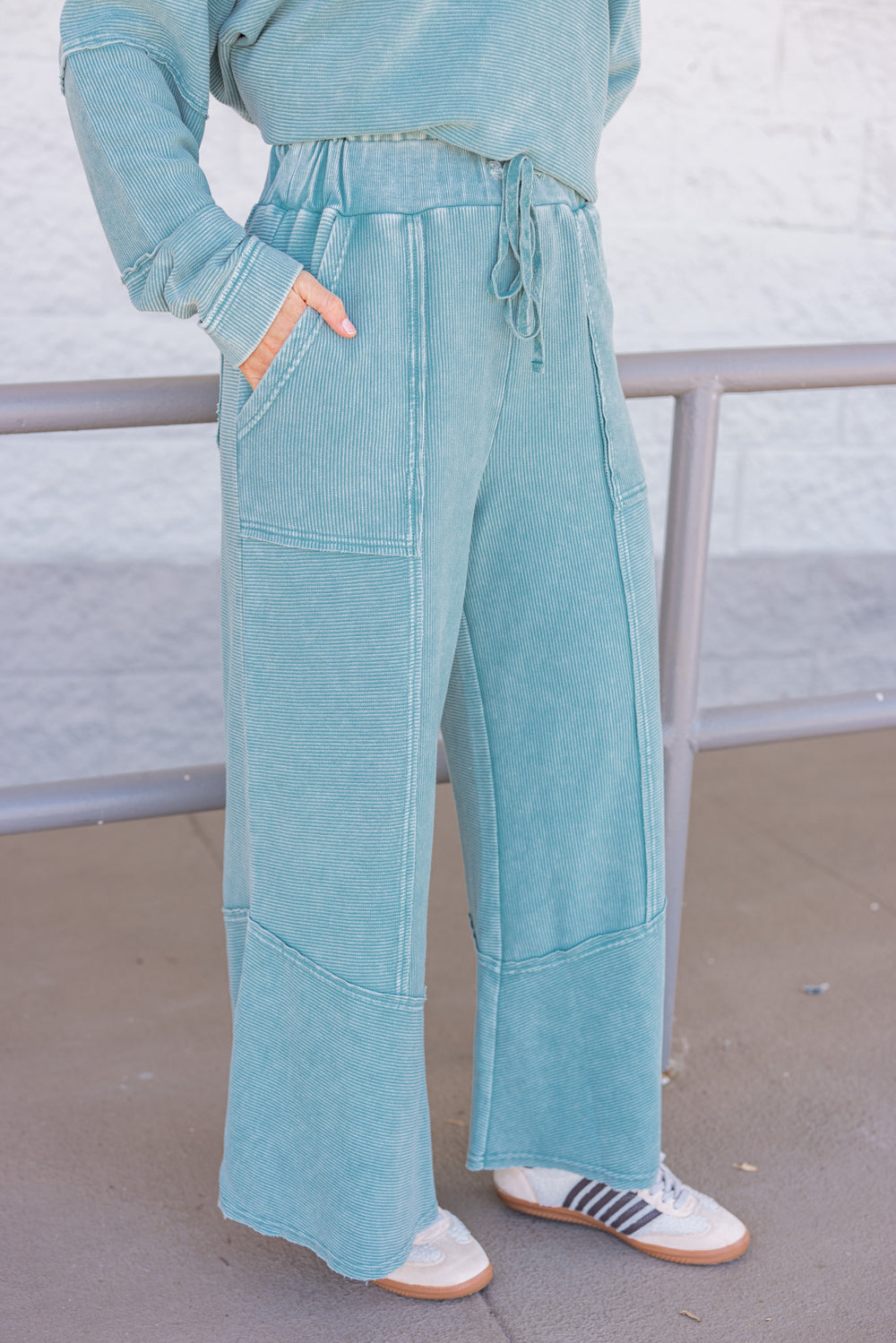 Women's mineral washed teal ribbed knit pants by Easel showing side view