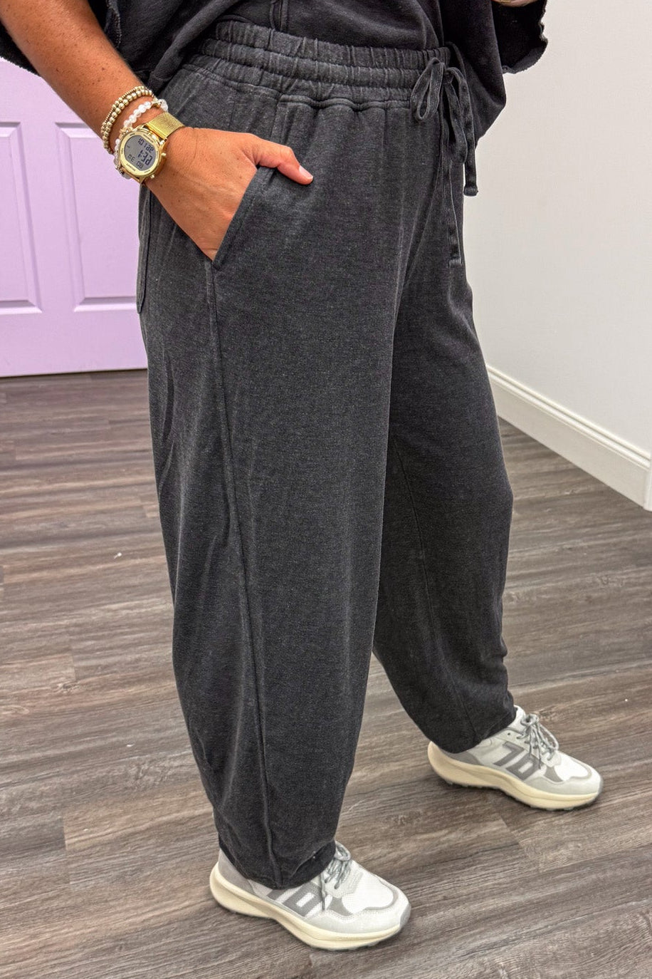 solid mineral washed black barrel leg semi-cropped knit loungewear pants with front pockets
