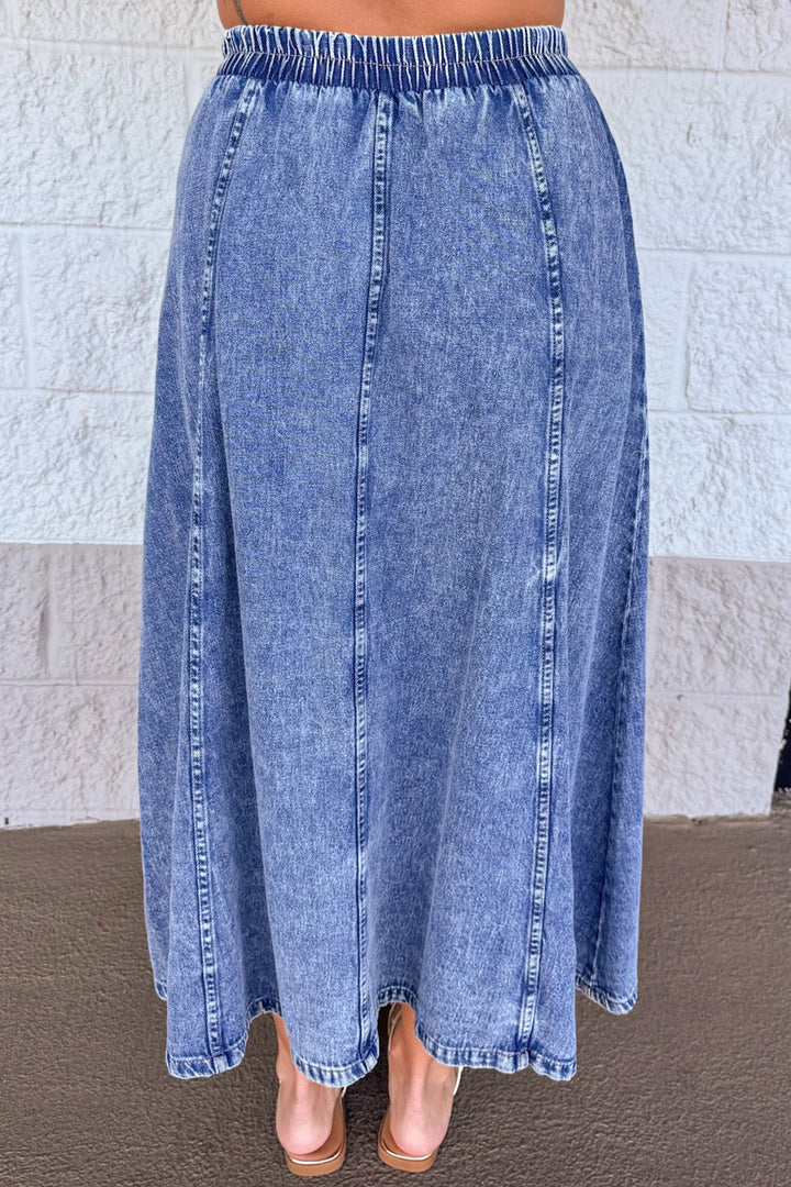 washed blue lightweight denim elastic waist flowy silhouette midi skirt