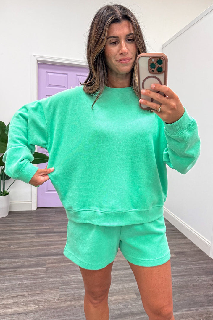 solid washed green relaxed silhouette pullover top and shorts matching knit loungewear set