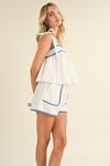 &merci White babydoll top and shorts set with blue scalloped embroidered trim