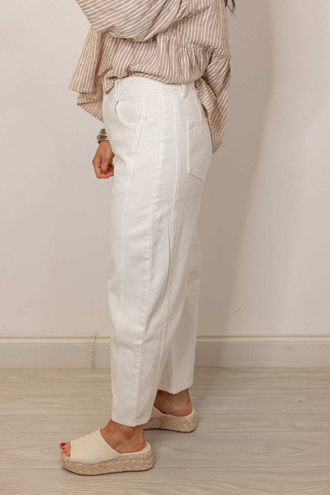 white narrow barrel leg denim pants