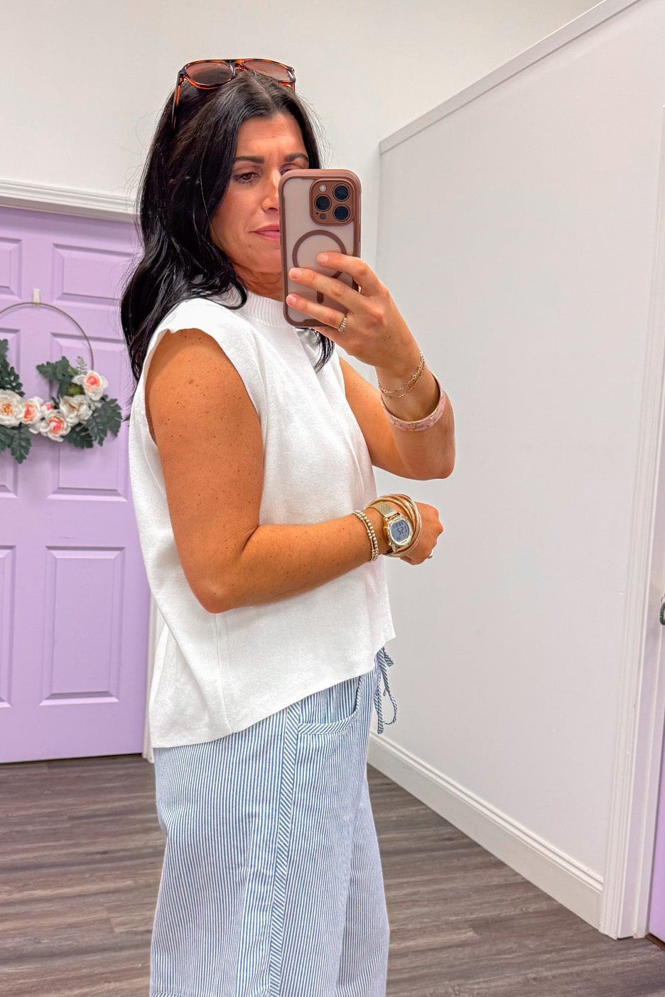 elevated basic white knit top with subtle high low hem