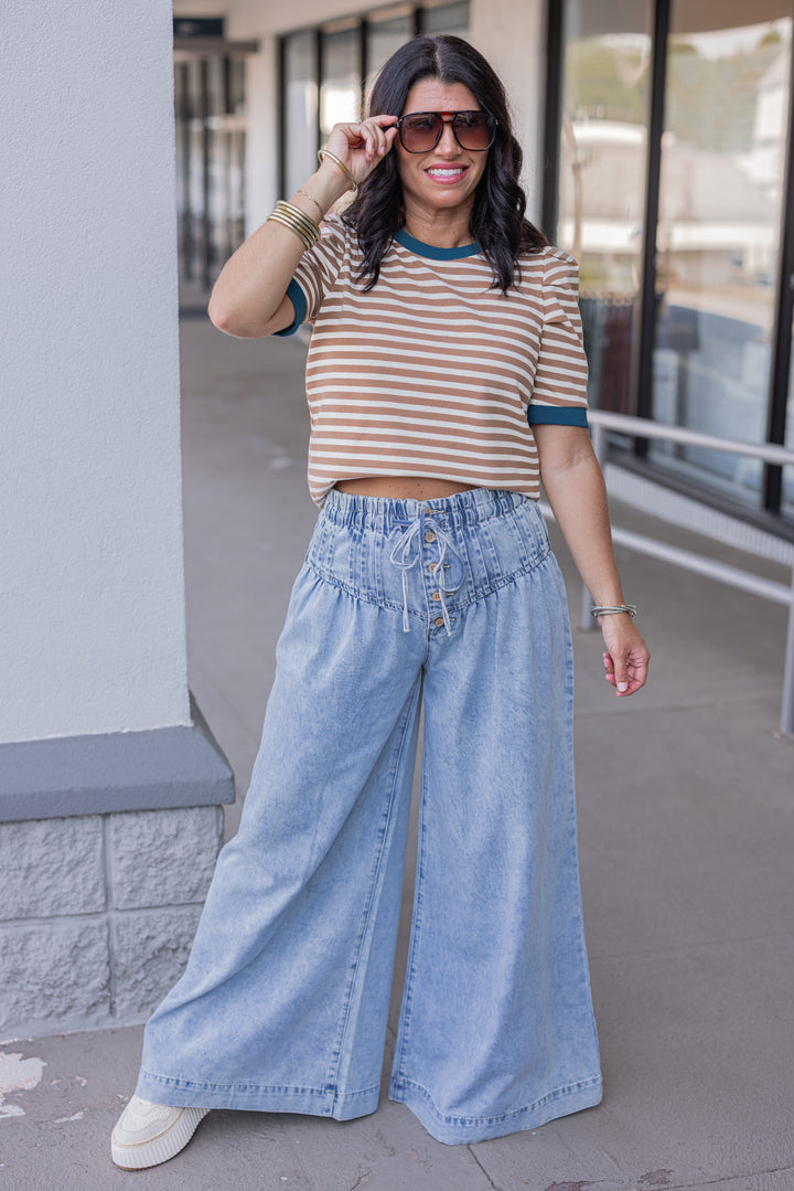 Women's tan striped knit textured top with dark turquoise trim by Entro showing full front view