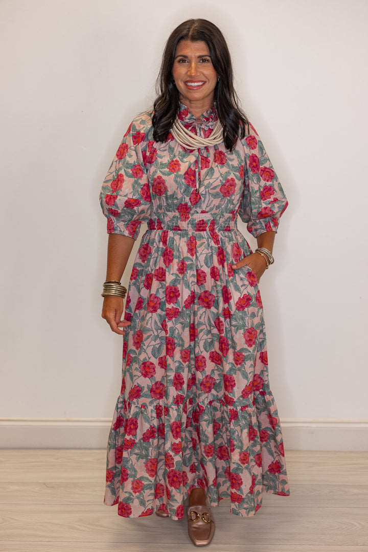 Women's pink and green floral maxi dress with puff sleeves and ruffle detail by Entro showing full front view