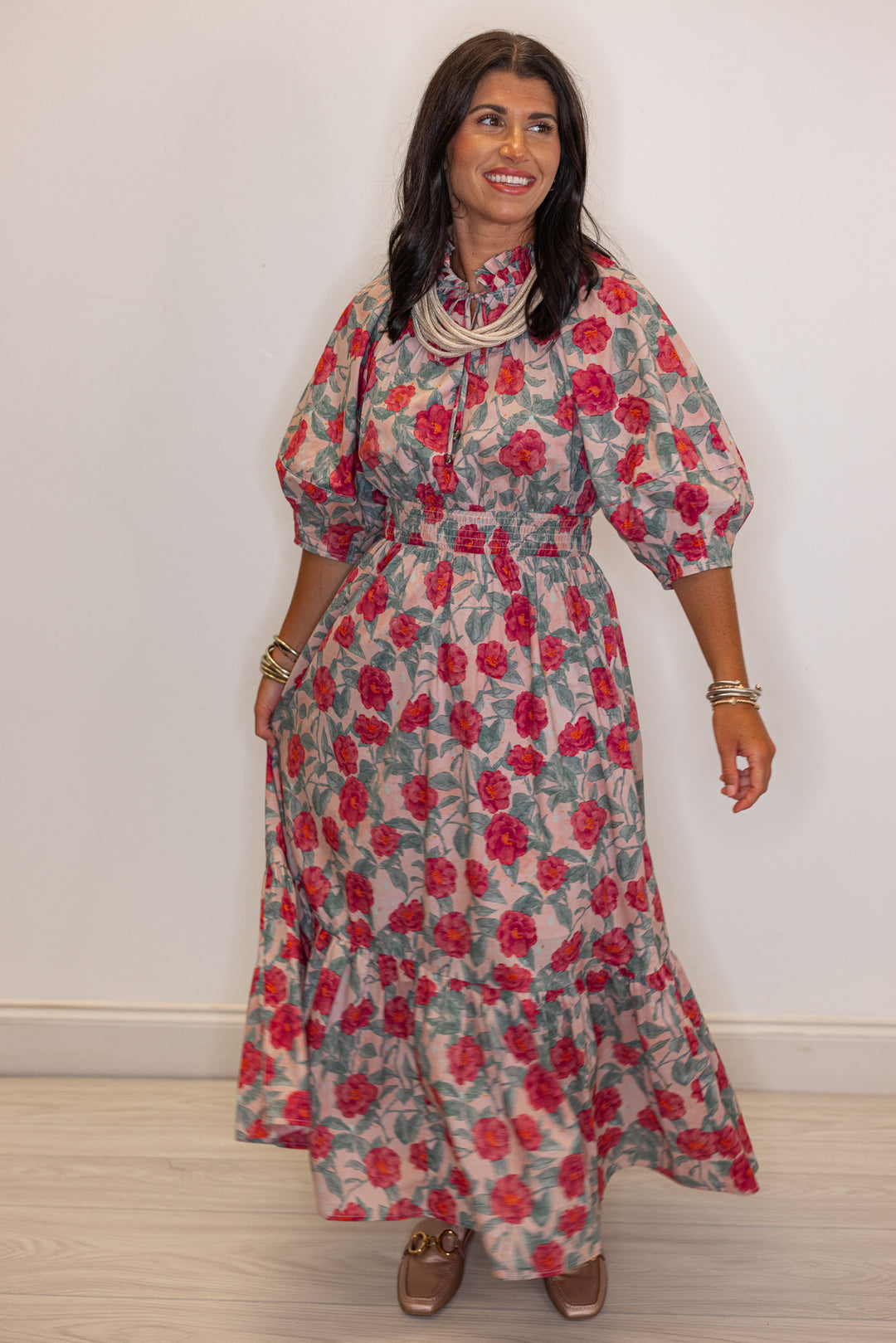 Women's pink and green floral maxi dress  by Entro showing puff sleeves
