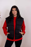 black puffer vest