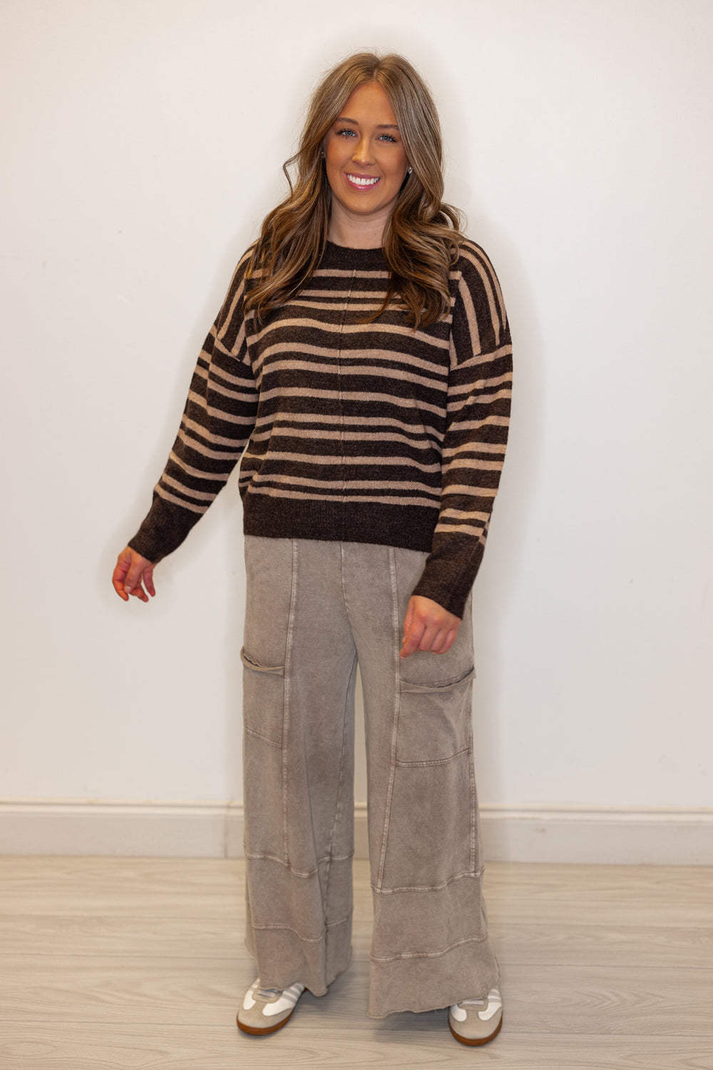 Women's brown and mocha striped sweater knit top with front seam detail by Blu Pepper showing full front view