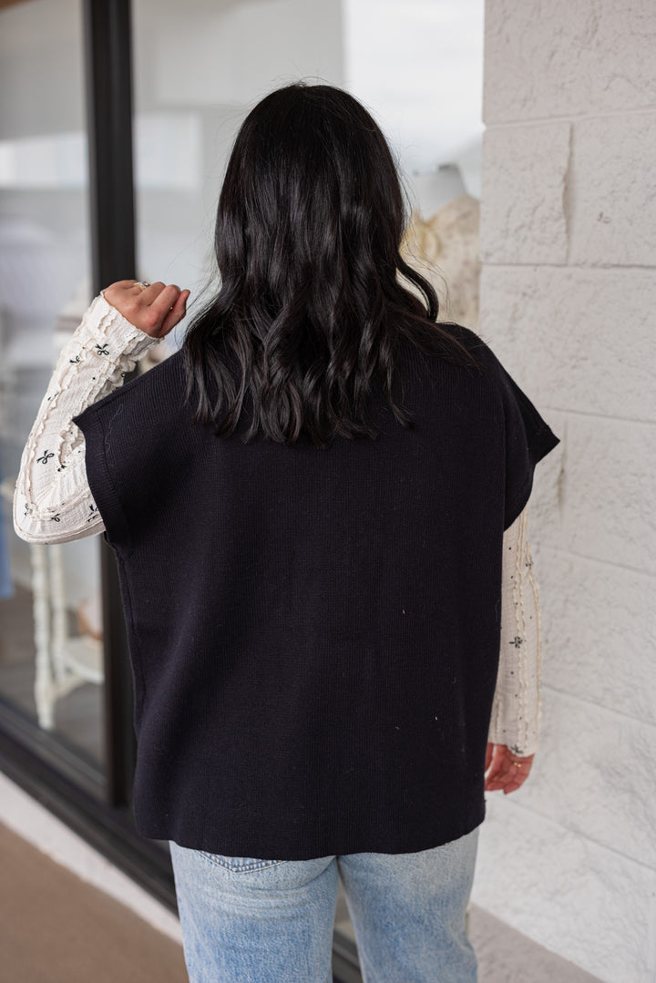 Women's black ribbed knit short dolman sleeve mock neck top by Jodifl showing up close back view