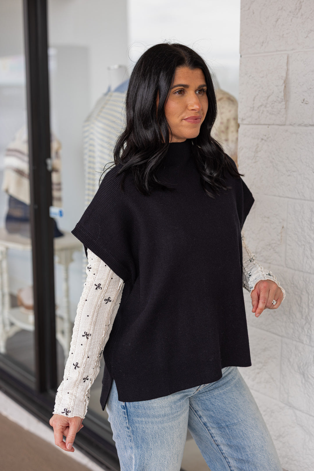 Women's black ribbed knit short dolman sleeve mock neck top by Jodifl showing up close side view
