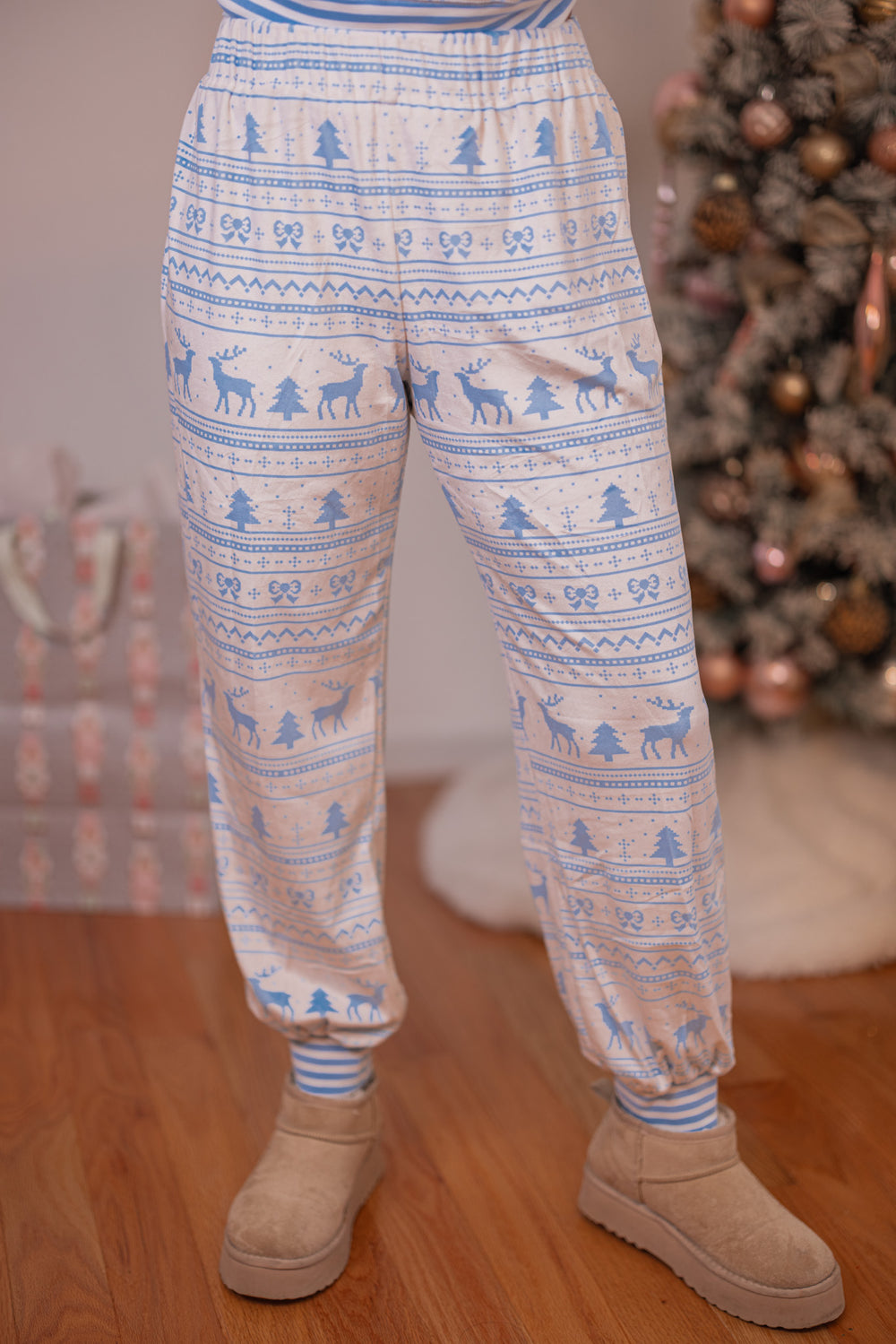 Women's white and light blue Christmas Winter print fleece pajama jogger pants by Peach Love California showing up close front view