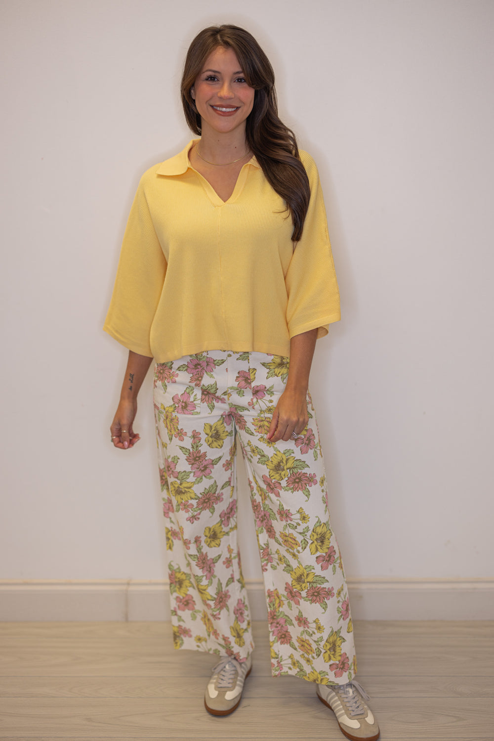 Women's butter yellow ribbed knit top with a collar by Entro, perfect for Easter outfits