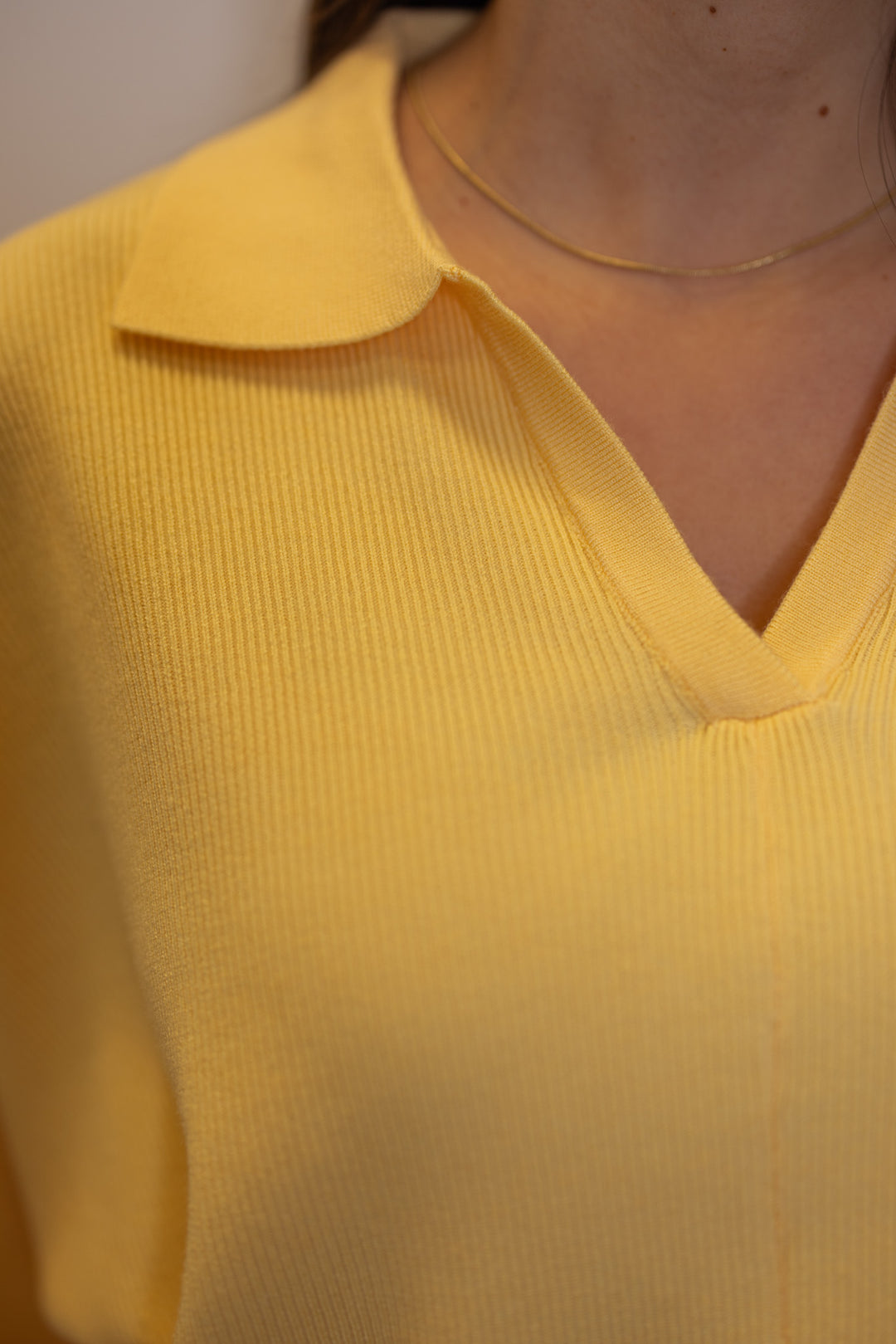 Women's vneck butter yellow ribbed knit top with a collar by Entro