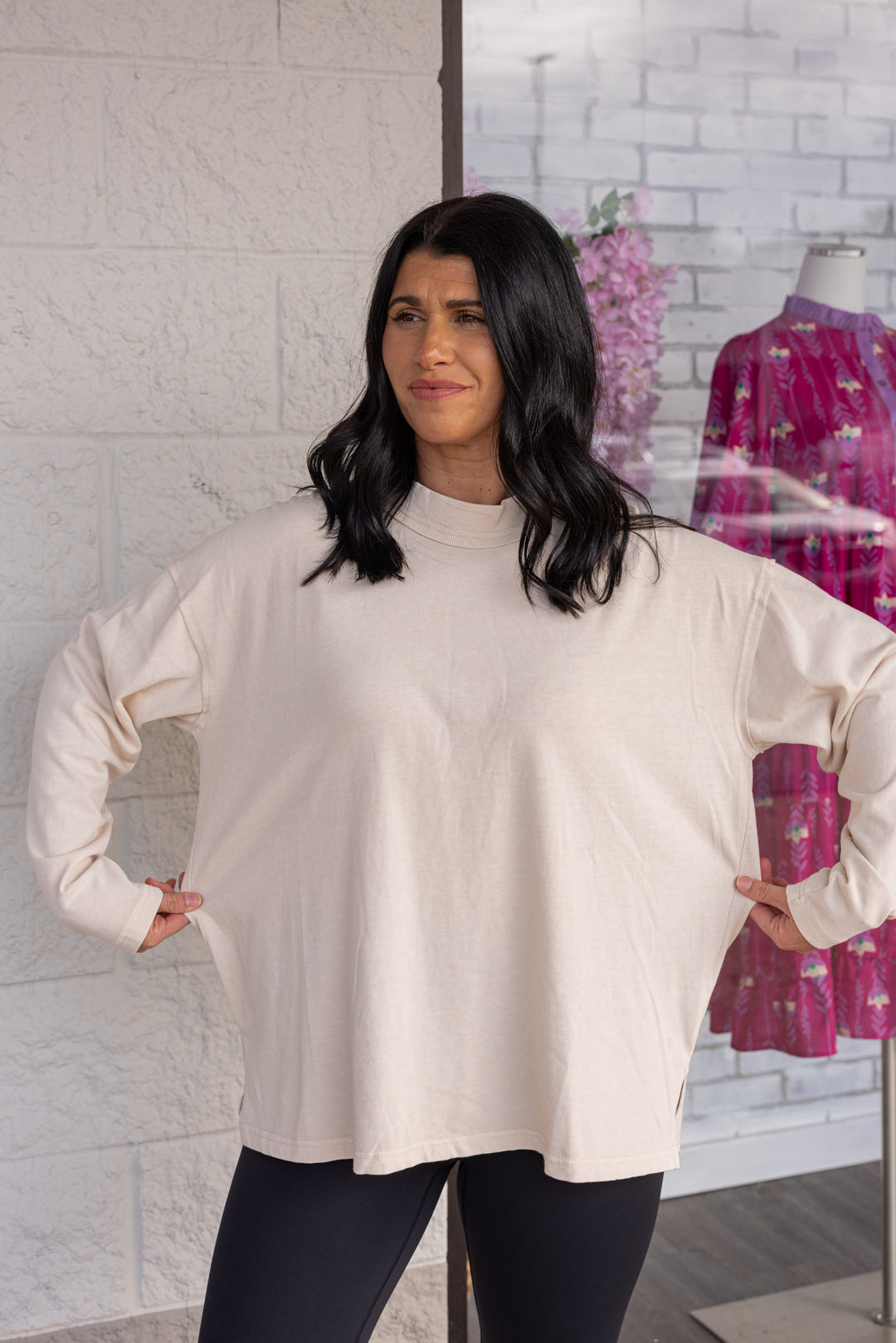 Women's off white knit long sleeve top by Jodifl showing true to size fit