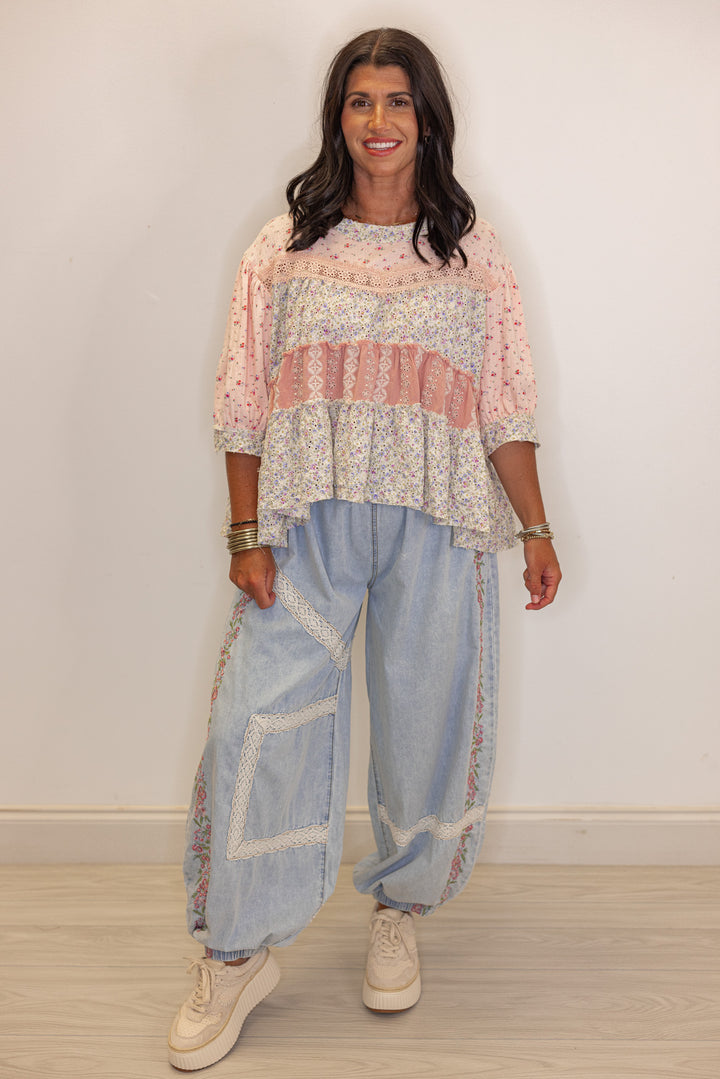 Women's pink and ivory floral patchwork top with embroidery and eyelet details by POL showing full front view