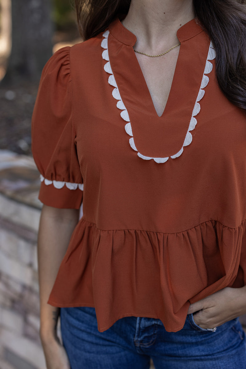 rust ricrac trim peplum top