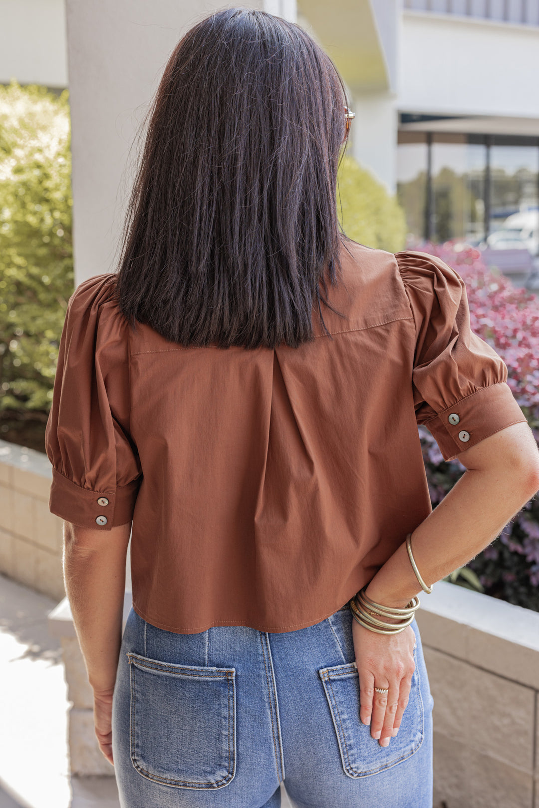 Women's caramel puff sleeve button front cropped top by Entro showing up close back view