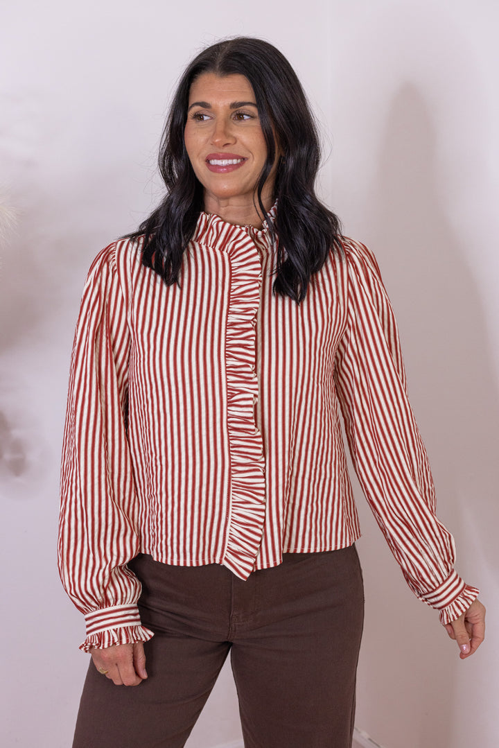 Women's red and cream striped button front top with ruffle trim details by &merci